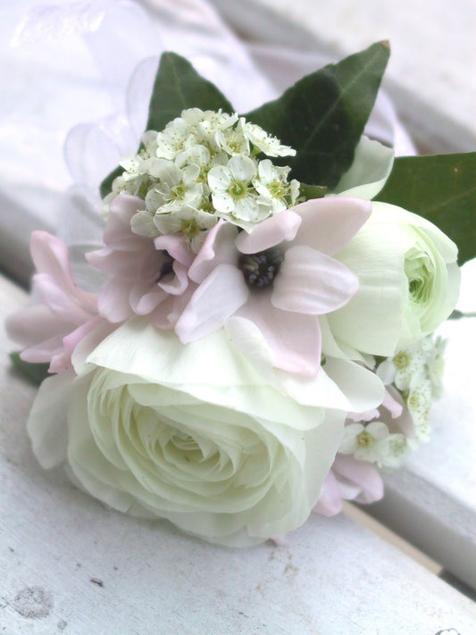 Pastel pink & white wrist corsage